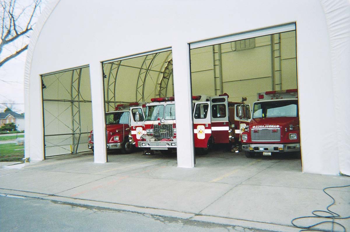 3 door bay for service vehicles in a white fabric structure