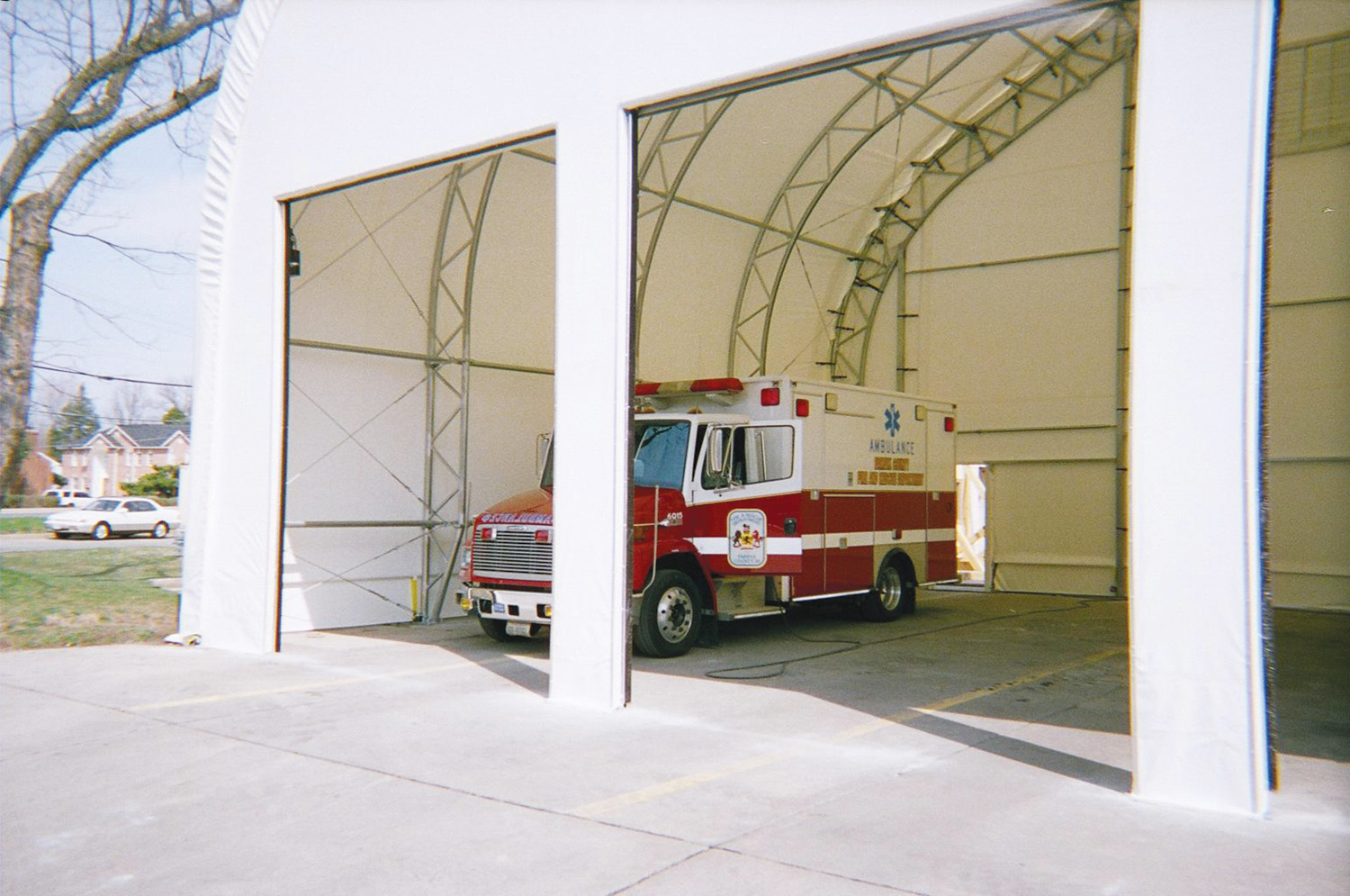 3 door bay for ambulance in a white fabric structure