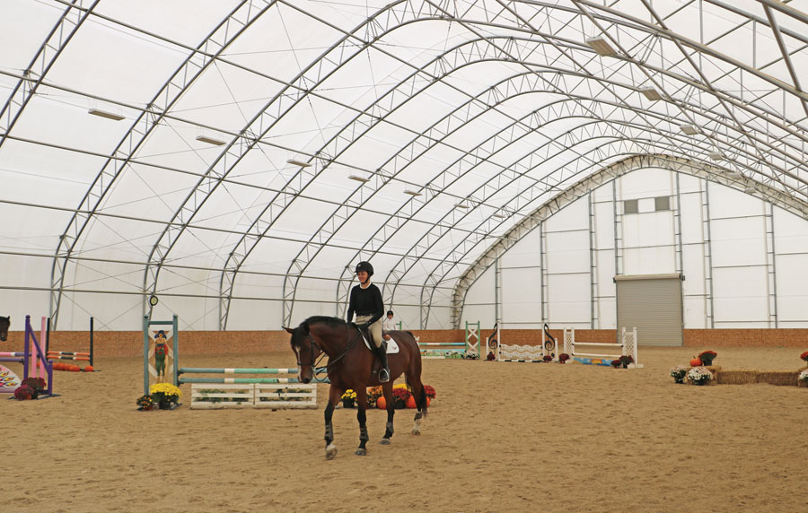 Horse Riding Arena inside photo with lighting and end wall accessories