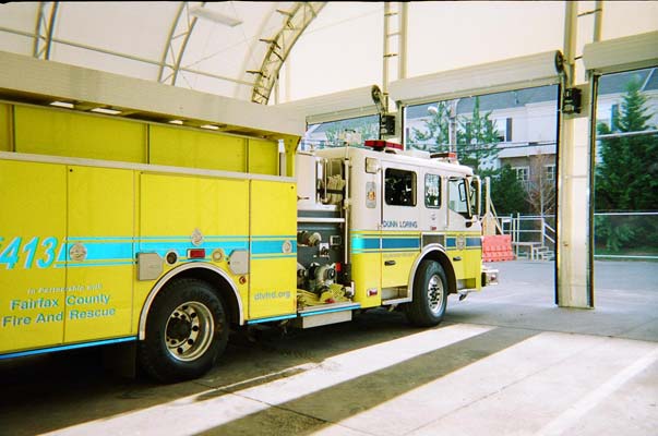 3 door bay for yellow firetrucks in a white fabric structure