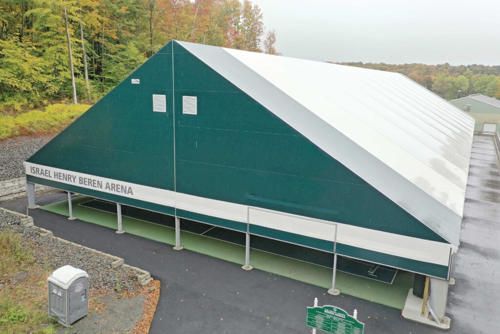 green and white fabric recreational building